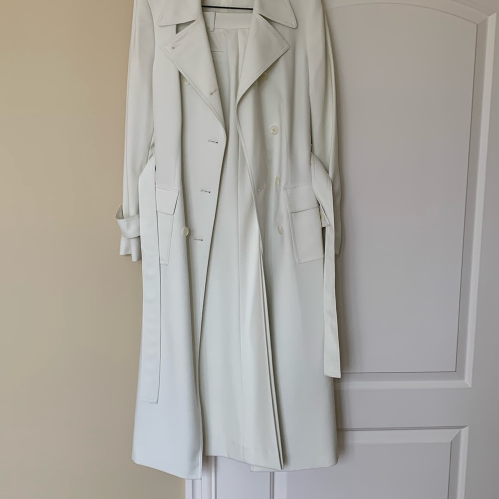 Wonderful designer pants and long jacket. Ivory color.